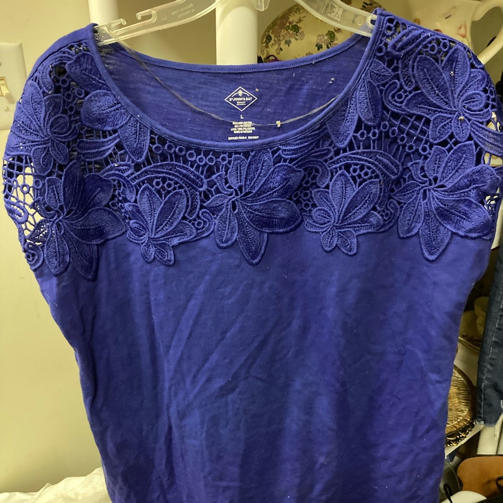 Woman’s blue top